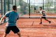 © David Prado/Stocksy - Men playing padel