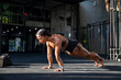 © Jovo Jovanovic/Stocksy - Athletic woman working out at the gym alone
