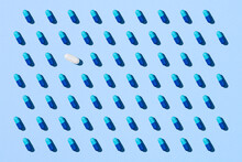 Seamless Pattern With Blue Pills On Blue Background.