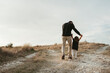© Irina Polonina/Stocksy - A father walking with a small daughter outdoor.