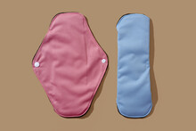 unfolded and folpink and blue cloth menstrual padsded cloth mens