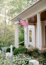 Southern Front Porch With American Flag