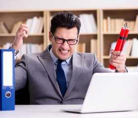 Wall Mural - Businessman with dynamite in the office