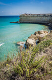 Fototapeta Morze - The Punticeddha Beach or Spiaggia Punticeddha of Sant'Andrea, Salento Adriatic sea coast, Apulia, Italy. Beautiful shore with cliffs and rocks of Puglia. Blue water, Summer day, top view, no people
