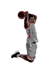 Sticker - Silhouette of professional sportsman playing basketball on white background