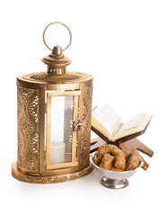 Wall Mural - Muslim lantern with Quran and Turkish sweets on white background