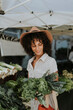 © Rawpixel.com - Beautiful woman buying kale at a farmers market