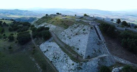 Poster - CORUM, TURKEY - Jul 07, 2021: A drone view of the Yerkapi pyramid of Hattusa Hattiti ancient city in Turkey