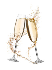 Glasses with sparkling wine and splashes on white background