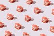 Pattern made of Vampire teeth or jaw on bright background. Halloween horrible creative concept. Minimal horor authentic idea.
