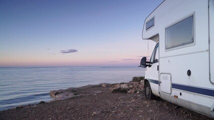 camper vehicle camping by sea. traveling by motorhome. caravan vacation. nature and activities.