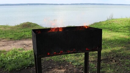 Wall Mural - barbecue and grill spot at lake shore