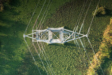 Transmission Tower Or Pylon In Top View. That Substation, Utility, Infrastructure Or Steel Structure For Network Of Electrical Grids System To Carry High-voltage Wire, Cable Or Overhead Power Line.