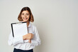 © SHOTPRIME STUDIO - cheerful business woman in white shirt documents copy space office