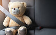 © Shisanupong - Teddy bear wearing seat belt for safety