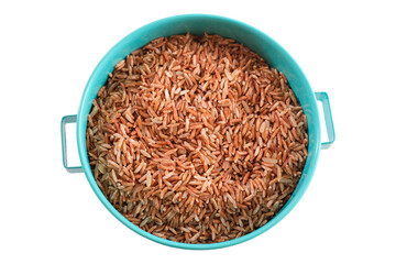 Wall Mural - Germinated Sangyod brown GI Muang Phatthalung rice in the blue bowl isolated on white background. Healthy food.Top view. Flat lay. 