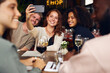 © Southworks - Friends taking selfie in wine bar