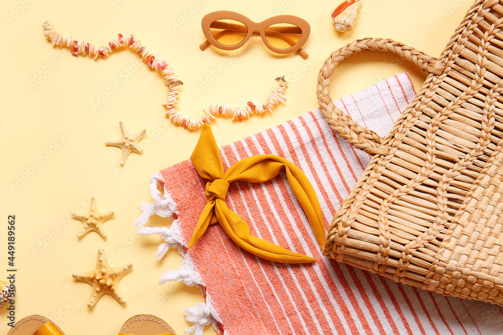 Composition with beach accessories on color background, closeup