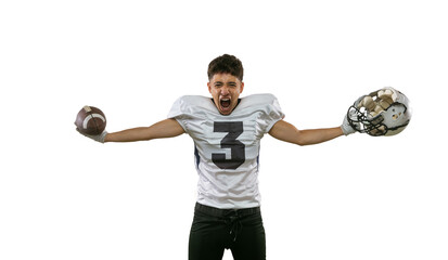 Winner, champion. Portrait of American football player training isolated on white studio background with green grass. Concept of sport, competition