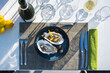 © ADDICTIVE STOCK - Oyster's dish paired with champagne at outdoor high cuisine rest