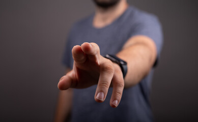 Poster - Businessman pointing or touching finger in screen..