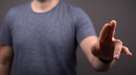 Poster - Businessman pointing or touching finger in screen..
