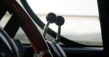 Close Up Panning Shot Of Throttle Lever On Luxury Yacht.