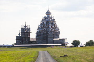 Wall Mural - Kizhi Island and Kizhi Pogost wooden church open-air museum,  summer vibrant view of  Onega Lake, Medvezhyegorsky District, Republic of Karelia, Russia