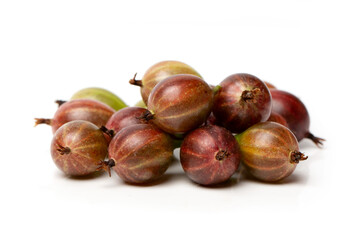 Wall Mural - Close-up of a ripe red gooseberry berry, isolated on a white background