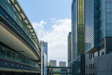 Fototapeta Londyn - Looking Up Blue Modern Office Building
