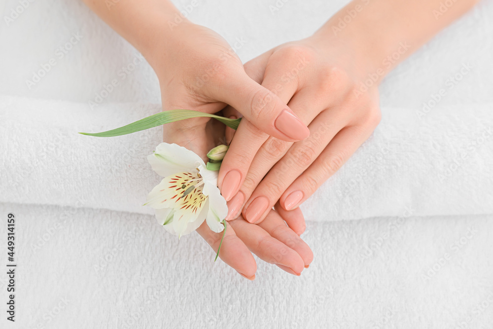 Woman with beautiful manicure in salon