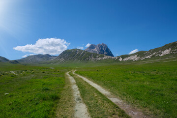 dirt road that crosses campo imperatore towards the gran sasso abruzzo