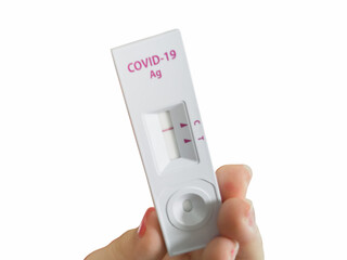 Hands see only fingers. Show antigen test kit, test results, not infected, white background, isolated.