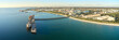 © Austockphoto - horizontal shot of Kwinana bulk jetty with large ship docked at the port