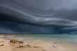 © Austockphoto - A dark shelf cloud approaches over the ocean