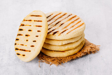 Wall Mural - Arepas made with corn flour and cooked in a pan, it is similar to a corn tortilla