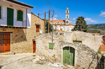 Wall Mural - The mountain village of Lofu, known since the 14th century, by its name (lofos - hill) describes the features of the local landscape. Stone-paved streets climb on gentle slopes       