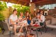 © Impact Photography - People having fun celebrating friend's birthday