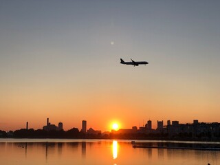  airplane landing at sunset
