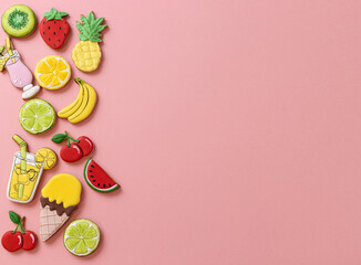 Wall Mural - Tropical summer theme colorful sugar icing cookies on light pink background, tropical fruit cookie shapes