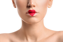 Beautiful Young Woman With Heart Painted On Lips Against White Background, Closeup