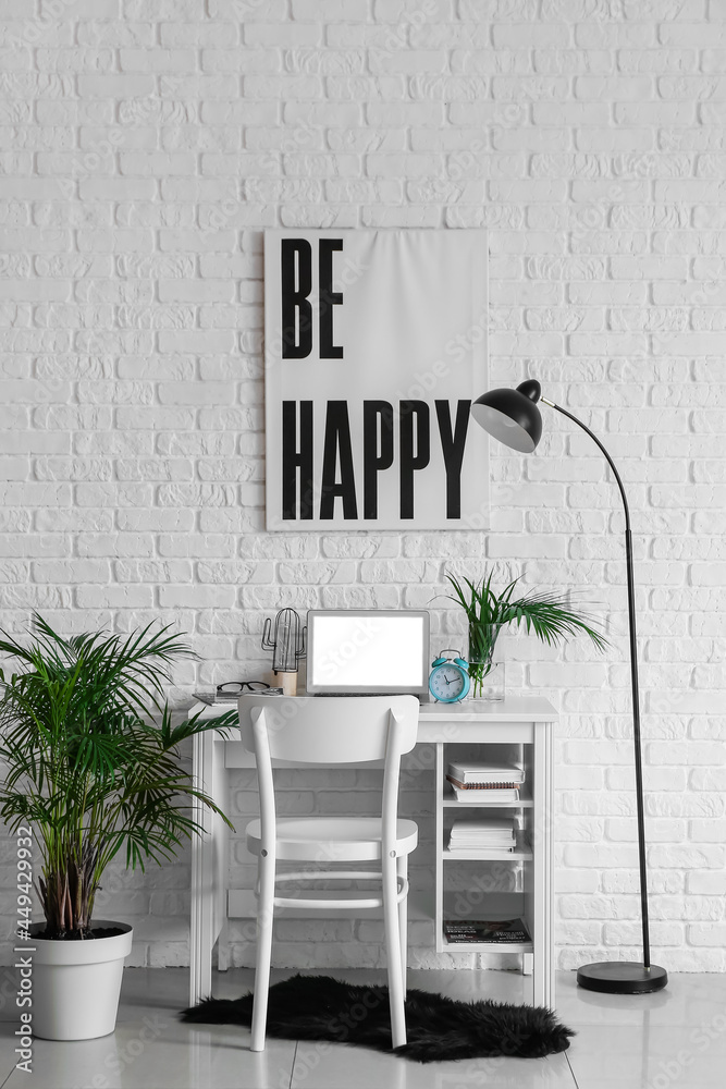 Interior of modern room with comfortable workplace