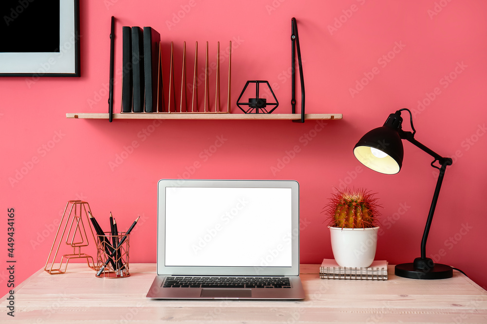 Interior of stylish room with modern workplace