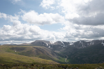 Wall Mural - clouds over the mountains