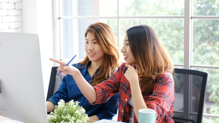  Asian women at home office, Happy two young asian women working with computer at office, Asian friends working together with happiness, Asia girl working at home, online education