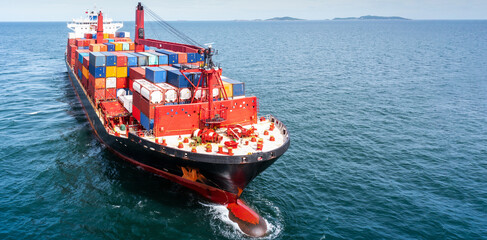 Aerial side view of cargo ship carrying container and running for export  goods  from  cargo yard port to other ocean concept freight shipping ship, webinar banner