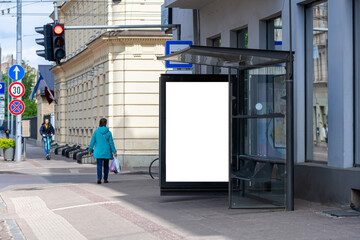 Wall Mural - bus stop with an empty poster mockup, template of an advertising banner on the stop of transport