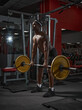 © Georgii - African american guy raises barbell with weights in gym. Strength training, losing weight, healthy lifestyle concept