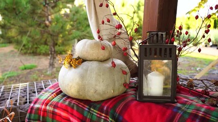 Poster - Backyard patio autumn decorations with pumpkin and lantern