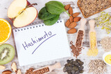 Fototapeta  - Nutritious ingredients and inscription hashimoto. Healthy food containing vitamins. Problems with thyroid concept